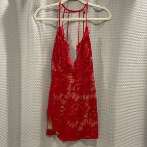 Red lace with nude under slip mini dress from Tobi. High side slit. Size Small.